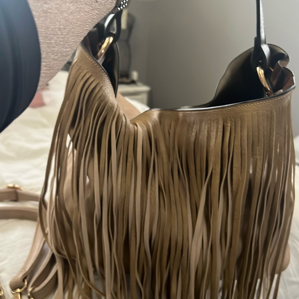 Leather like butter , Inside is soft brown suede .